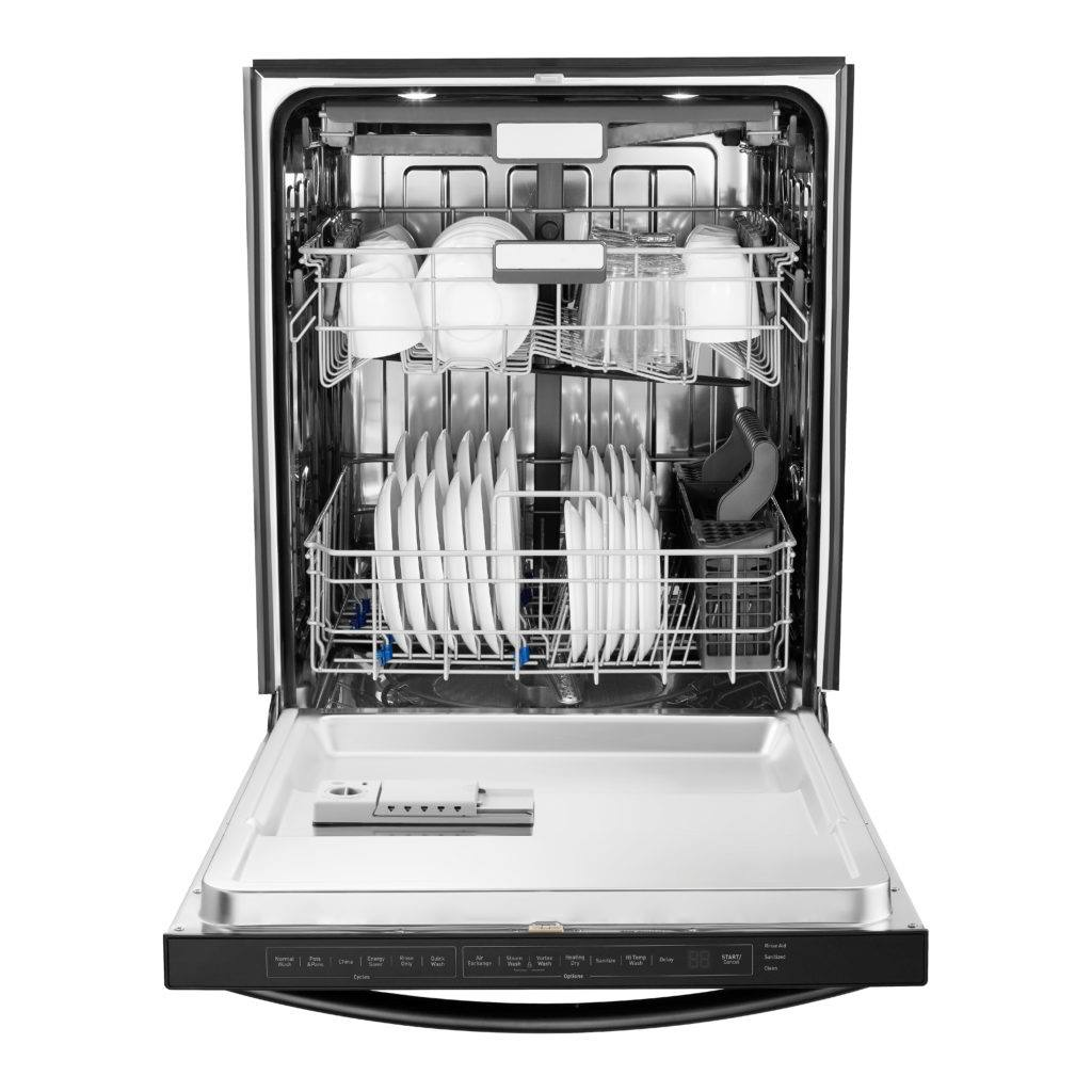 Interior of a dishwasher filled with neatly arranged dishes and glasses, ready for a wash cycle.